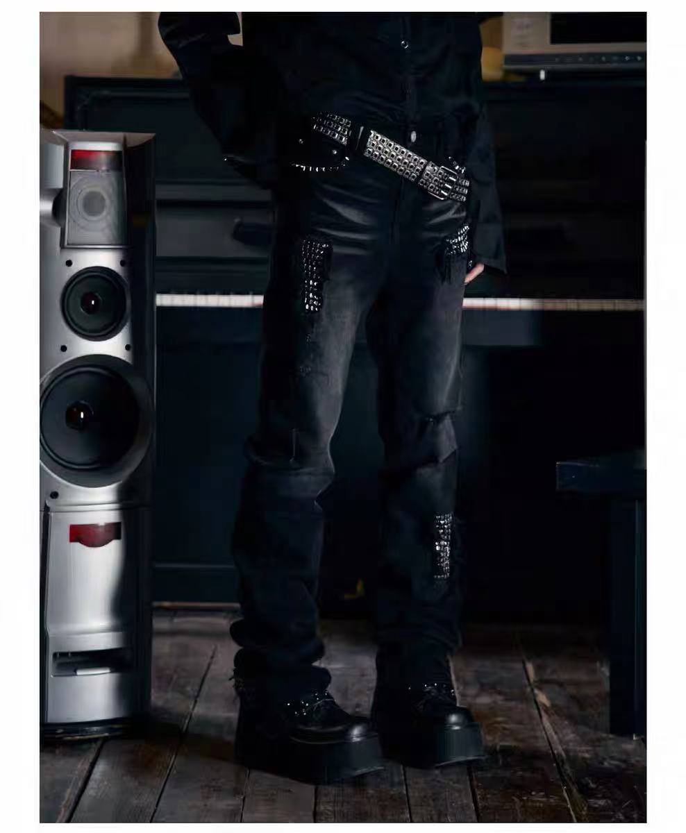 Madonna-style denim jeans with rivet holes