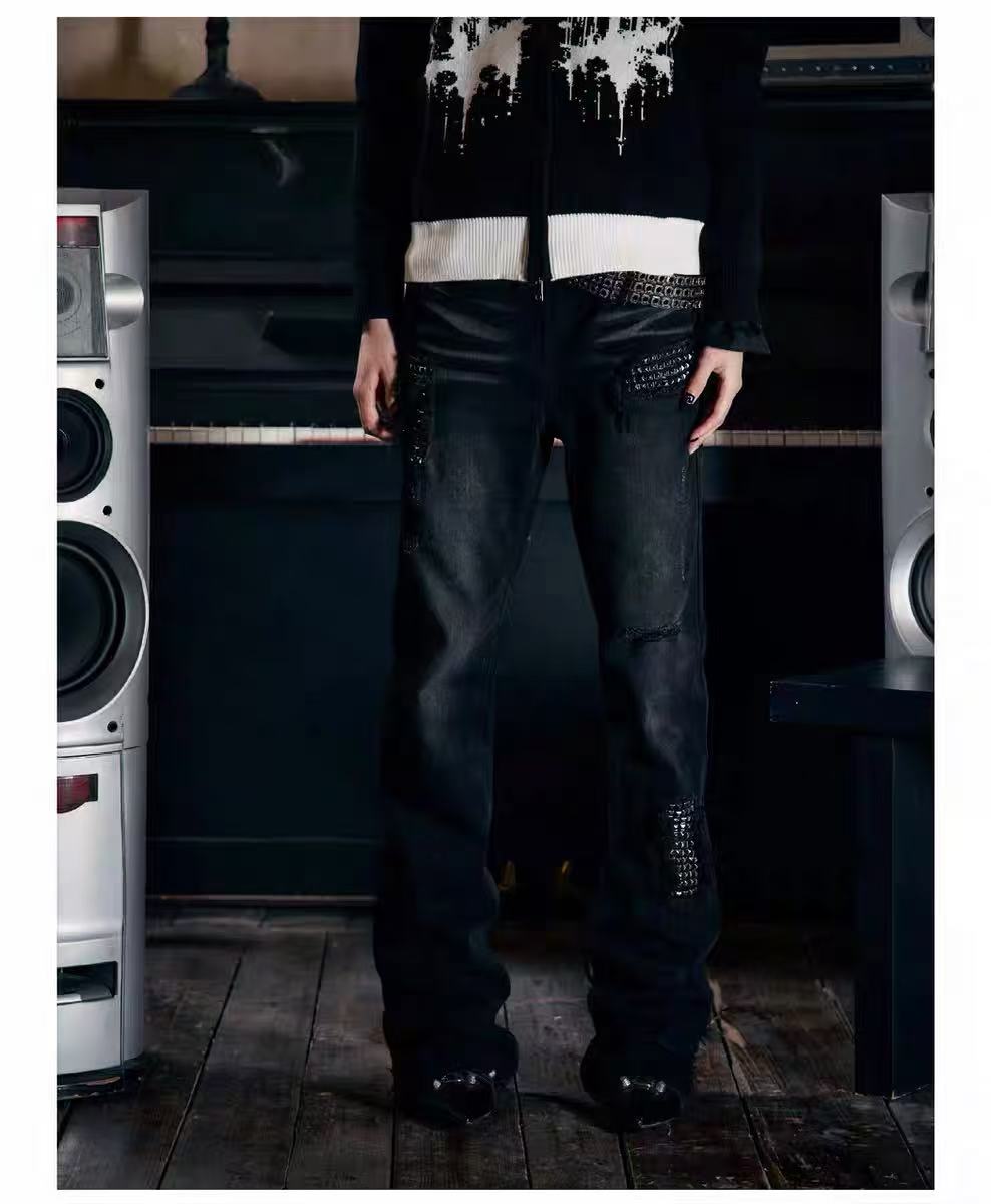 Madonna-style denim jeans with rivet holes