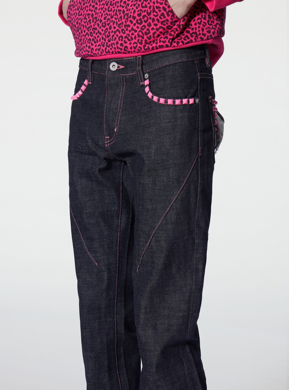 Contrast stitch flare denim close-up