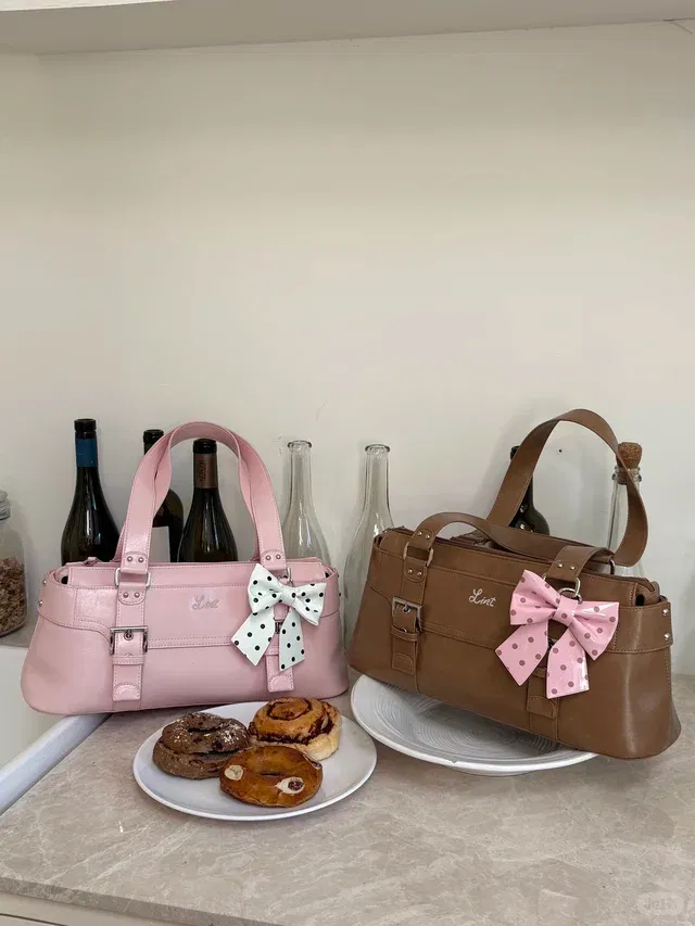 Bow Charm Barrel Shoulder Bag