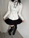 Accordion-Pleated Tie Stand-Collar Cotton Blouse with Fitted Waist