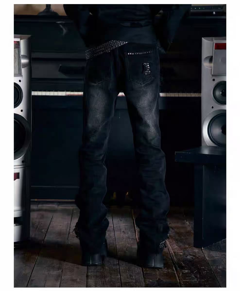 Madonna-style denim jeans with rivet holes