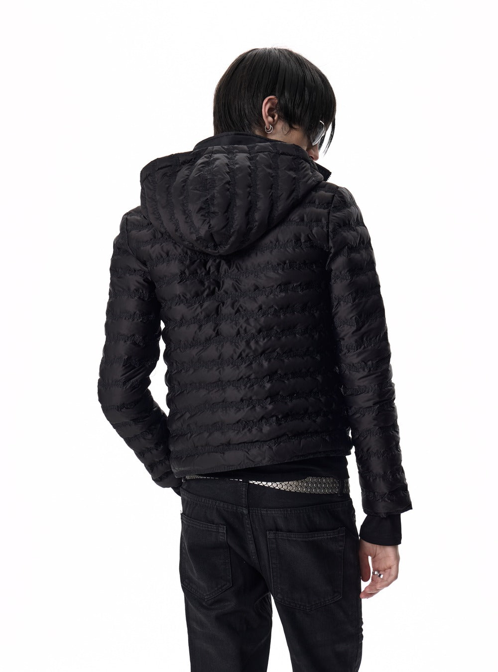 Wave quilted hooded jacket close-up