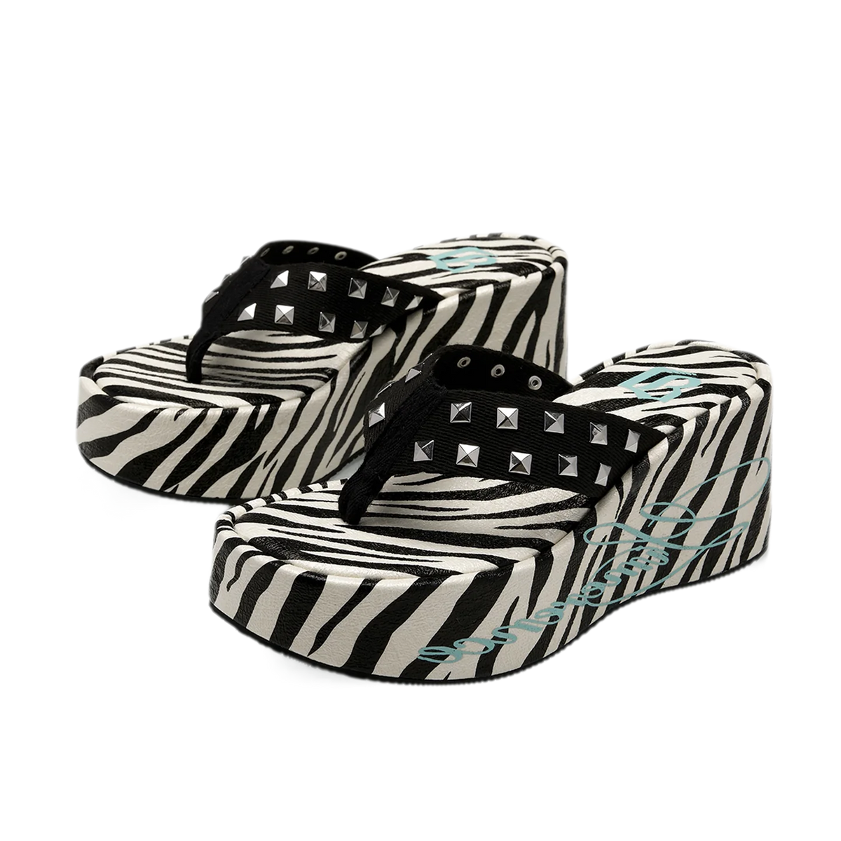 Studded animal print slides in zebra