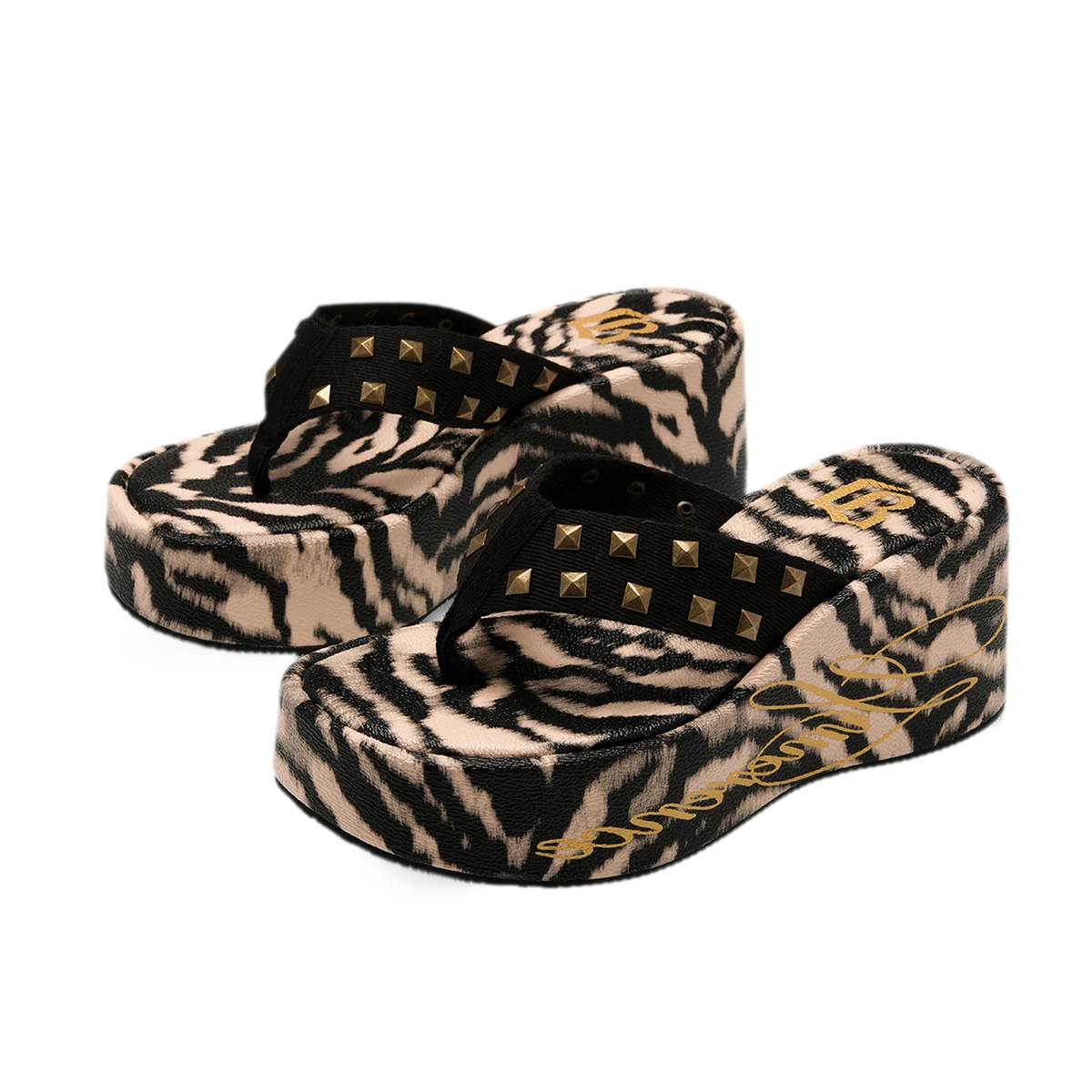 Studded animal print slides in tiger stripe