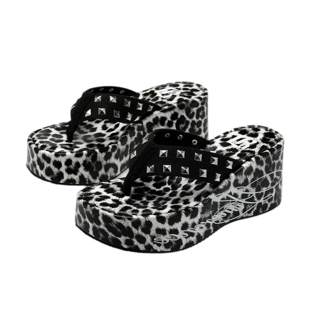 Studded animal print slides in snow leopard