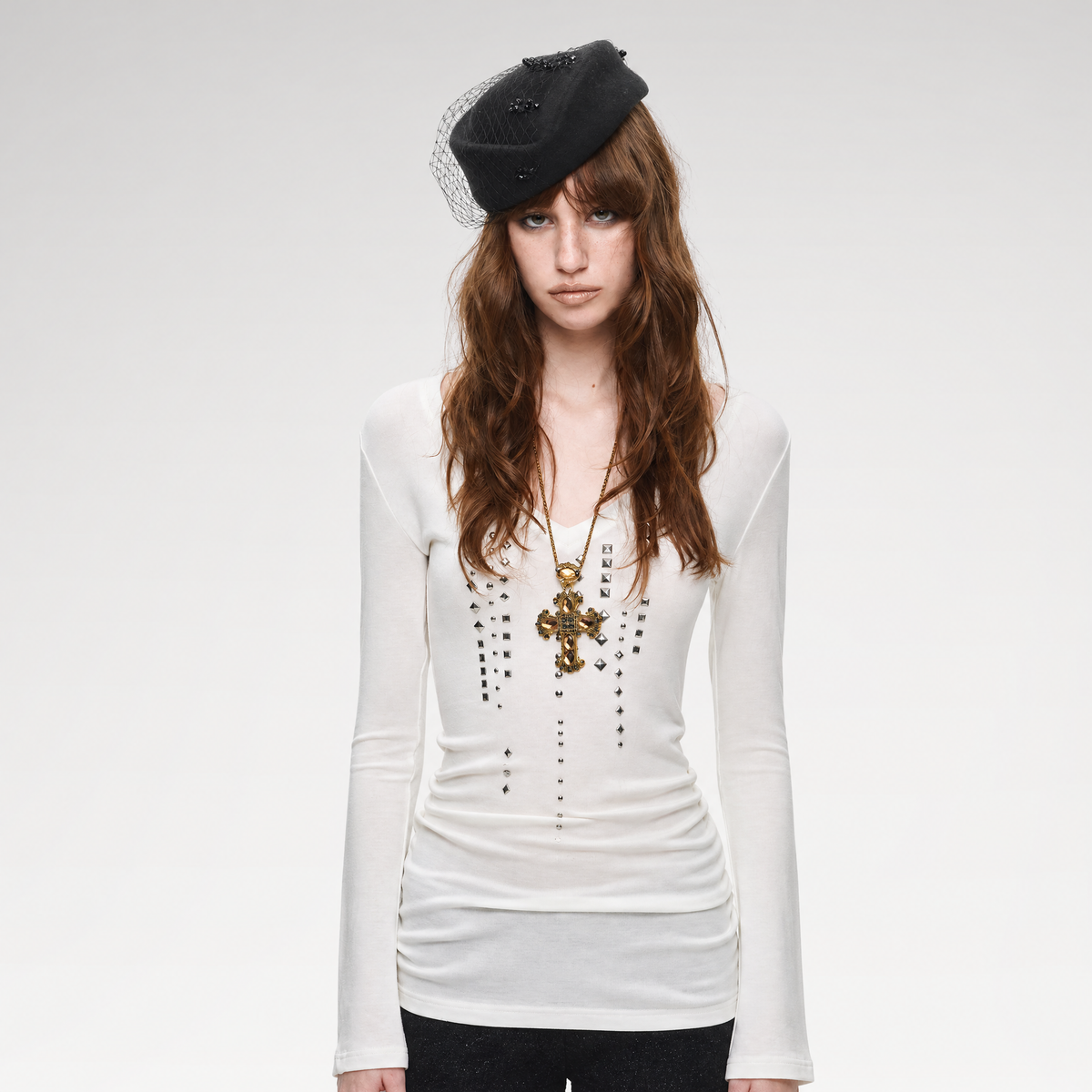 Rhinestone and rivet fitted V-neck knit top